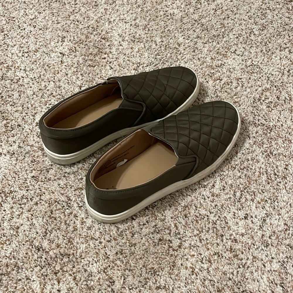 Slip on sneakers.